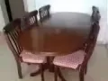 实木餐桌包括六把椅子，长1.8米， 宽1米 $200