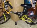 由于搬家出售八成新自行车