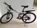 9.9成新自行车，前后碟刹、可折叠、带减震器.