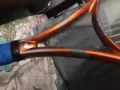 网球拍一个送两桶全新?