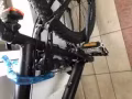 本人有一輛前後都帶減震的自行車！因本人回國！現在轉讓！
