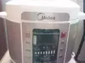 九成新美的高压锅