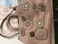 一个Coach粉色女包转卖