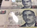 新加坡50元二张（有顺子号和双子号）