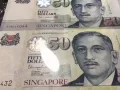新加坡50元二张（有顺子号和双子号）