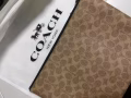 Coach 名牌手拿包