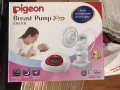 全新pigeon吸奶器