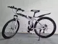 出售9.9成新26寸折叠变速自行车185新币